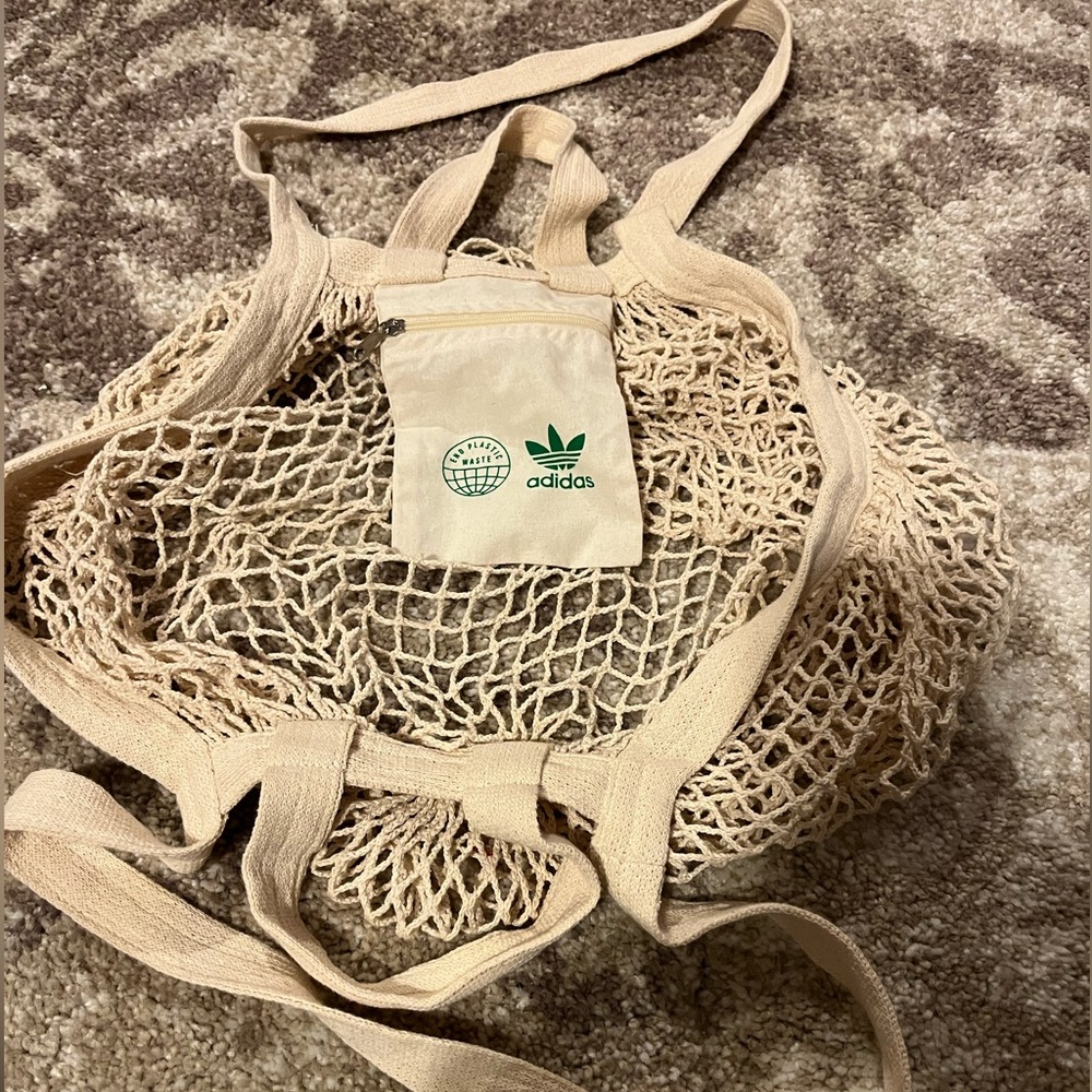 Adidas Reusable Cotton Mesh Grocery Bag with zip pocket for coins is new.